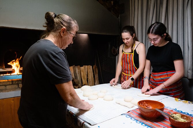Hands-On Bolo do Caco Baking Class with a Madeiran Family - Meet Tonia and her family bread-making team