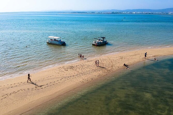 Ilha Deserta and Farol Island: a small group boat trip in Ria Formosa from Faro - Farol Island village walk: lighthouse views and Santa Maria Cape