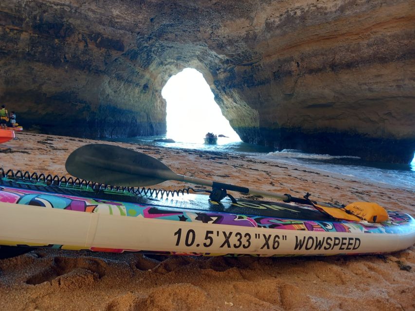 Lagoa: Benagil Cave and Marinha Beach Guided Kayaking Tour - Paddling past Marinha Beach’s golden arches