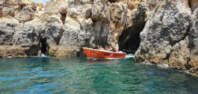 Lagos: Ponta da Piedade Caves Boat Tour - The boat and crew setup: built for tight passages, not big sightseeing