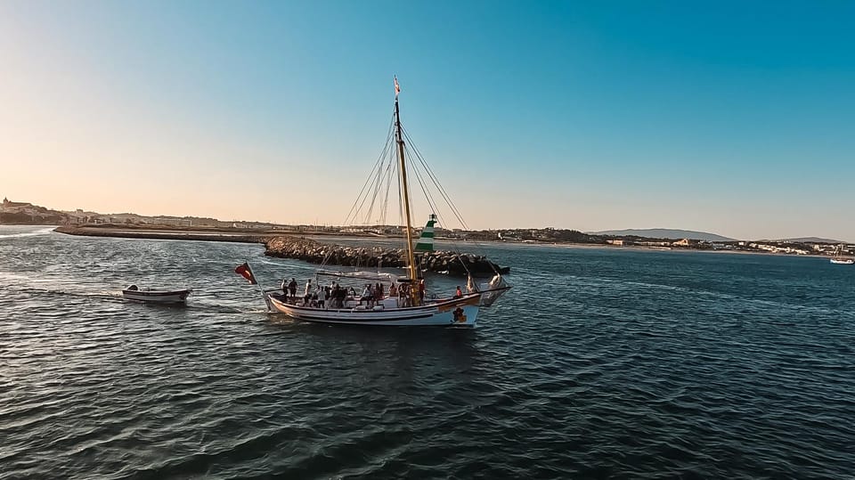 Lagos: Sunset Sail aboard a Traditional Boat with Prosecco - Return to Shore: Chilly Wind and City Lights Timing