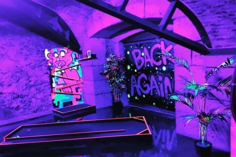 Lisbon: 18-Hole Indoor Minigolf Ticket with Bar Area - Natural Light Art Holes and the UV Neon Course Trick