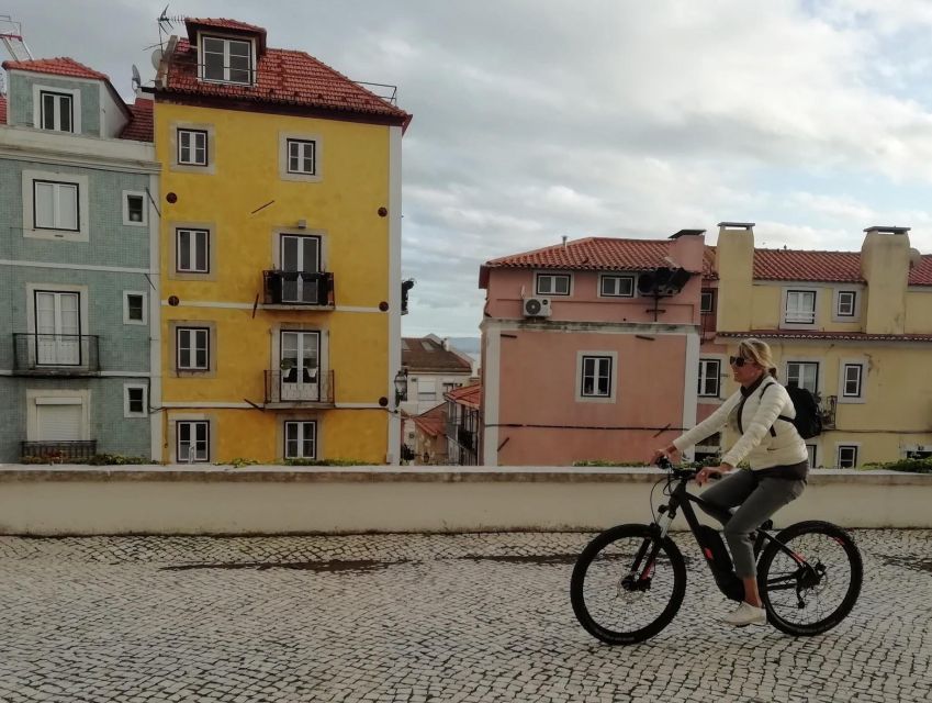 Lisbon: 7 Hills Panoramic Guided Tour by E-Bike - Graça: Neighborhood Energy Meets Hilltop Outlooks