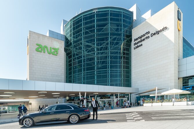 Lisbon Airport Private Transfer Round Trip - Arrival Hall pickup: nameplate meeting that helps you get moving fast