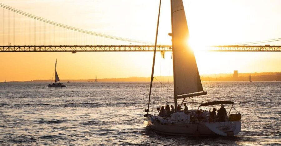 Lisbon: Alfama Charms, Tapas, Wine and Sunset Boat Cruise - The Tagus at sunset: the sailboat portion that changes your perspective