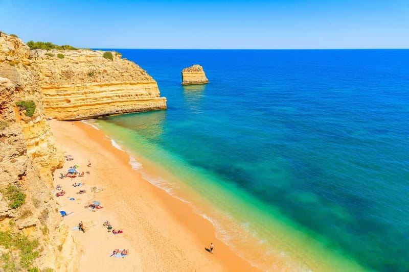 Lisbon: Algarve, Benagil Cave, Carvoeiro & Lagos Day Trip - Praia da Marinha: The Beach Stop That Feels Like a Set
