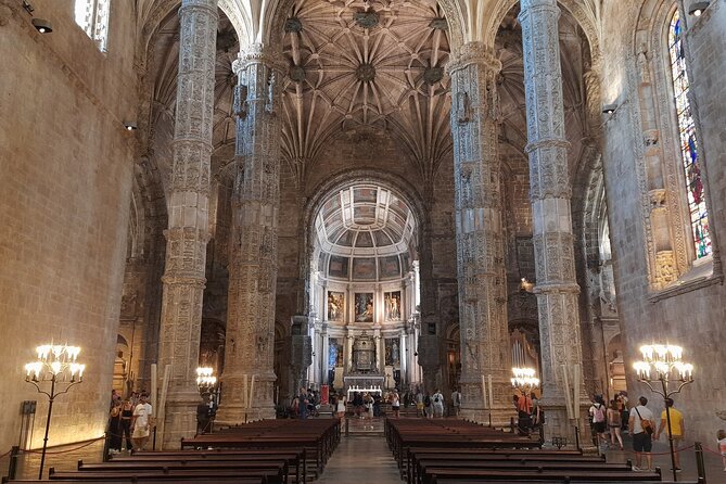 Lisbon: Belem Walking Tour with Jeronimos Monastery Tks Included - Jardim da Praça do Império: a garden with empire math