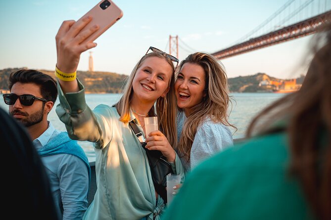 Lisbon Boat Party with Views, and Sunset Sailing - Belém and the river approach: sunset photos with a drink in hand