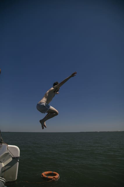 Lisbon: Catamaran Boat Party with Music, Open Bar & Dives - Price and Value: Is $57 Worth the Party Package?
