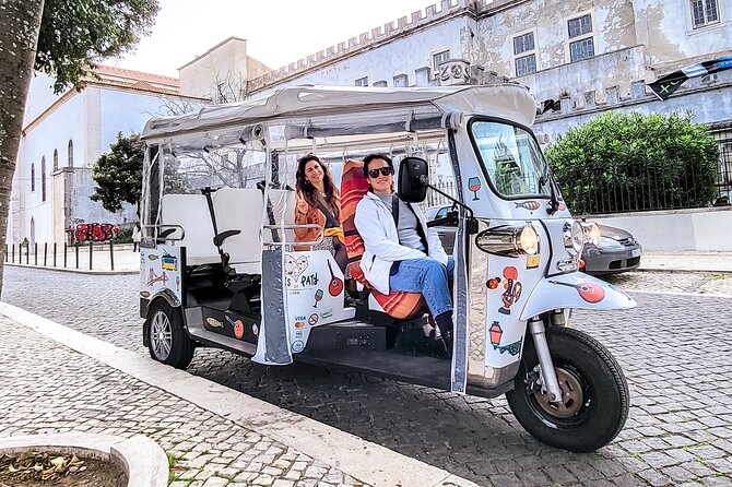 Lisbon Complete Tour! Eco TukTuk Private Guided - Alfama: narrow lanes, Fado atmosphere, and the royal palace footprint