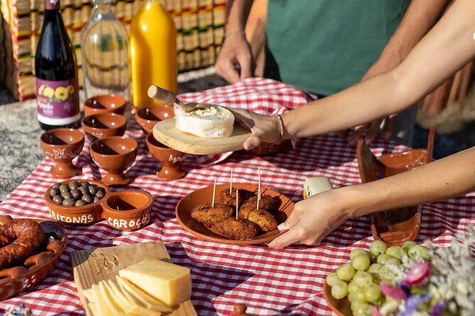 Lisbon Countryside Food Tour on a Vintage Car - What’s on the table: cod pastries, wine, and picnic-style comfort