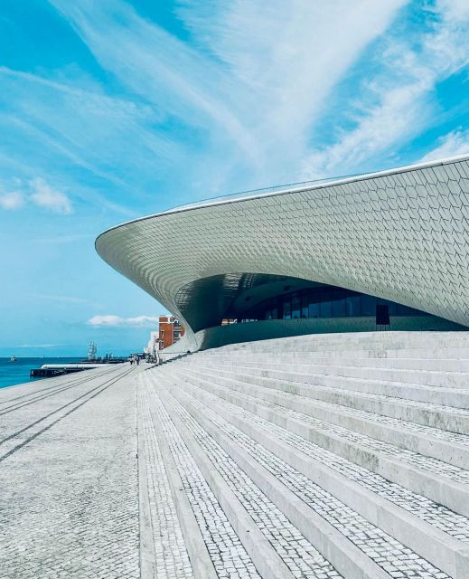 Lisbon: Discover Belem by electric Tuk Tuk - MAAT rooftop views: modern art energy with old-world framing