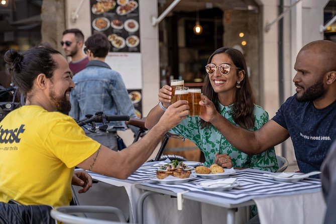 Lisbon E-Bike Guided Food Tour with Five Food Tastings - Stop-by-stop: Comércio Square, Alfama, Pantheon views, and more