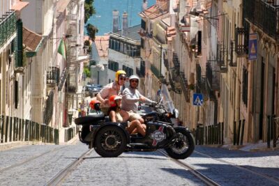 Lisbon El Cristo-Rei - Private Vintage Sidecar Tour - Rua da Bica: the quick tram moment that still feels iconic