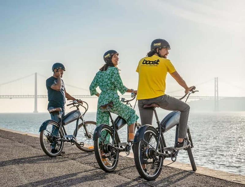Lisbon: Electric Bike Tour by the River to Belém - The ride under 25 de Abril Bridge and views toward Christ the King