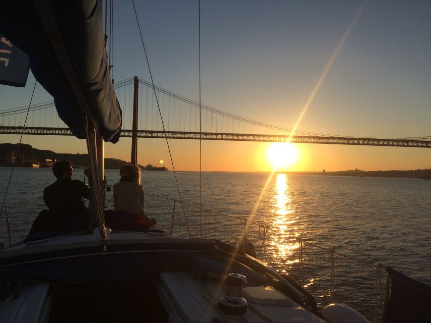 Lisbon: Enjoy a Sunset or Night Tagus River Sailboat Cruise - 25 de Abril Bridge and Christ the King: Lisbon’s giant symbols, from water level