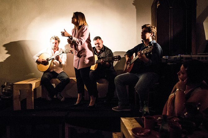 Lisbon Food Tour with 3 Stops and Fado Show Performance - Stop 2 at Mercearia in Alfama: petiscos with cheese, cold cuts, and Portuguese wine