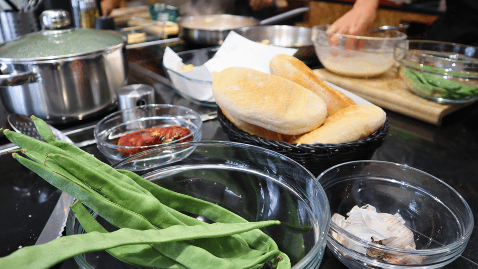 Lisbon: Portuguese street food cooking class with Drinks - The cooking experience: stations, teamwork, and clear chef guidance