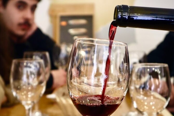 Lisbon Private Food Tour – Taste 10+ Local Dishes & Wines - Lisbon landmarks between bites: Santa Justa lift, old districts, convent history