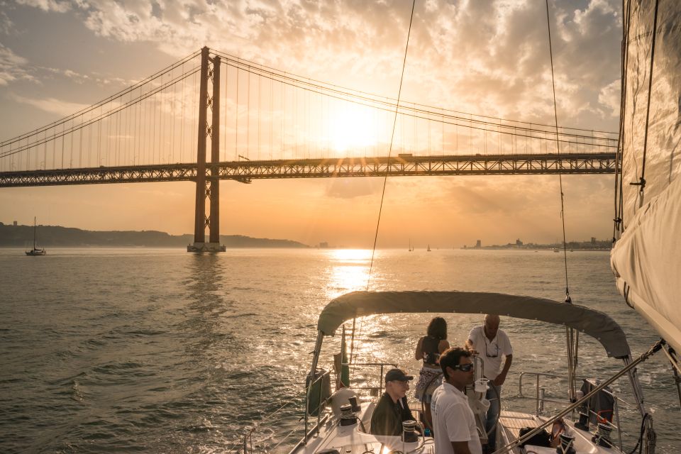 Lisbon: Private Sunset Cruise on the Tagus River with Drink - Mar da Palha Basin on the Starboard Side and the Vasco da Gama Bridge Fade-In