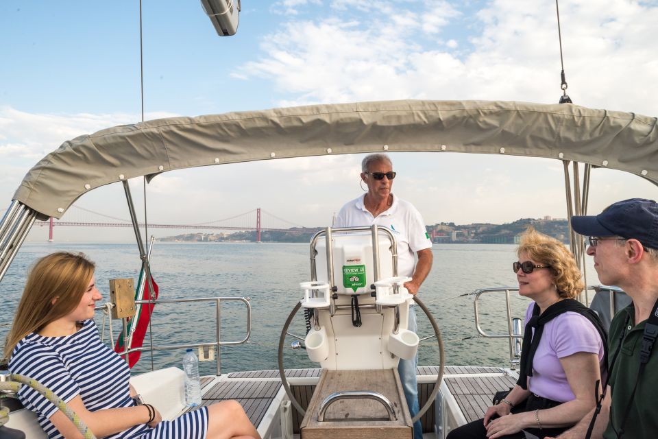 Lisbon: Private Sunset Cruise on the Tagus River with Drink - Almada’s Cristo-Rei Arms: The Sunset Finale