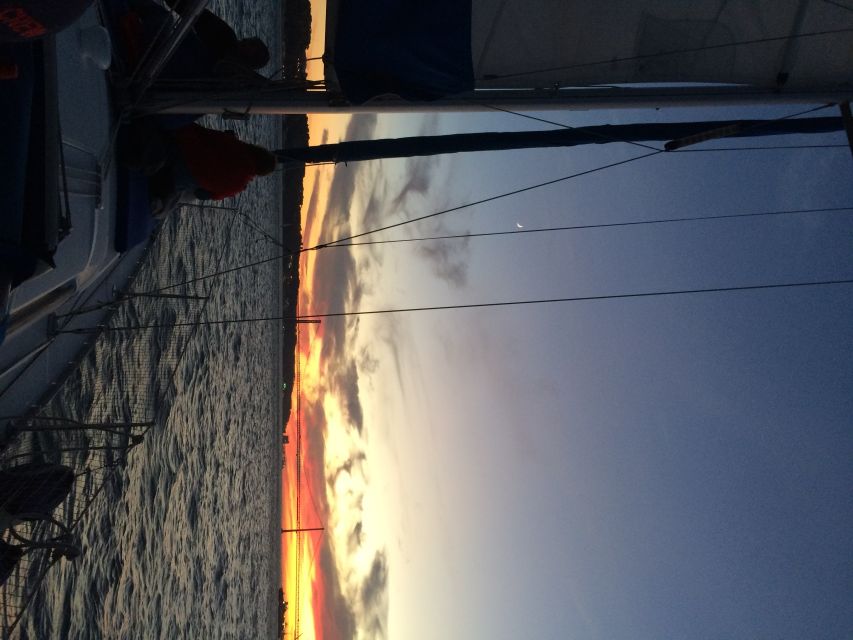 Lisbon: Private Sunset Sailing Tour with Champagne - On-board vibes: welcome drinks, bottle of champagne, and comfort that matters