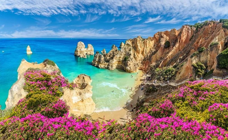 Lisbon: Private Tour Benagil, Algar Seco, Portimao & Lagos - Ponta da Piedade and Praia do Camilo: cliffs, stairs, and postcard angles