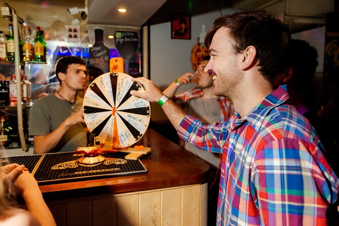 Lisbon: Pub Crawl with Open Bar, Shots & VIP Club Entry - Pink Street: Bars, Deals, and Drinking Games Without the Awkward Solo Factor