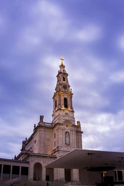 Lisbon: Sanctuary Fátima & Little Shepperd Town Guide Tour - Basilica of the Holy Trinity and Museu de Cera: the modern contrast