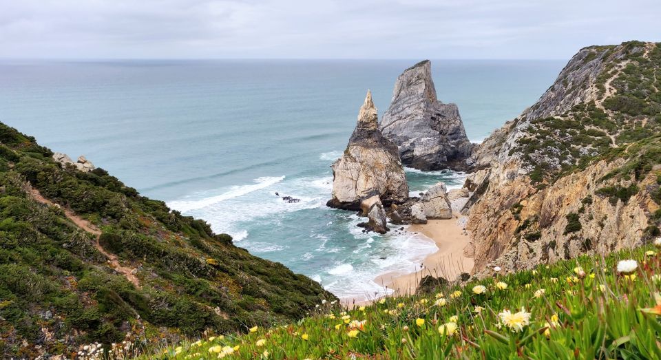 Lisbon: Sintra, Pena Palace, Quinta Regaleira, Cascais Tour - Pena Palace: Romantic architecture plus real wind-in-your-hair views