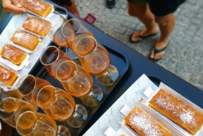 Lisbon Small-Group Food Tour with 18 Tastings in Alfama District - Stop 1 in Alfama: where the food tells you what Lisbon is