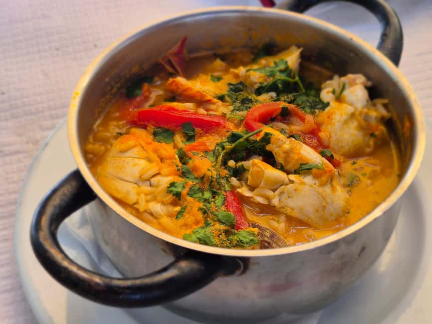 Lisbon Small-Group Food & Wine Tour Eat & Drink like a Local - Chouriço Assado plus red wine: smoky street food done the Portuguese way