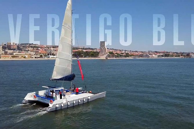 Lisbon Sunset Catamaran Cruise on the Tagus River - The Christ statue view: drama on the water