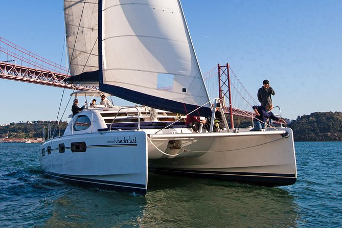 Lisbon: Sunset Cruise With Drinks on Spacious Yacht - On Board Comfort: Open Deck Space, a Net to Lounge, and Life Jackets