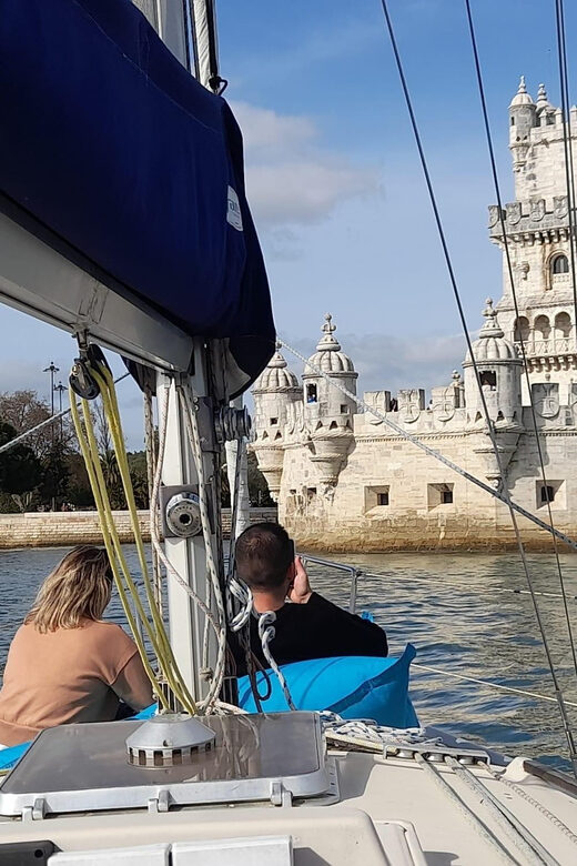 Lisbon: "Sunset" & "Day Tours" by boat, with drink and music - What’s on board: comfort, bathroom, blankets, and Bluetooth music