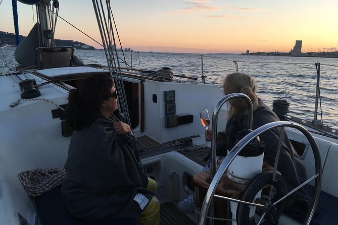 Lisbon Sunset Sailing Tour with White or Rosé Wine and Snacks - Cristo Rei from across the Tagus: a giant statue with real context