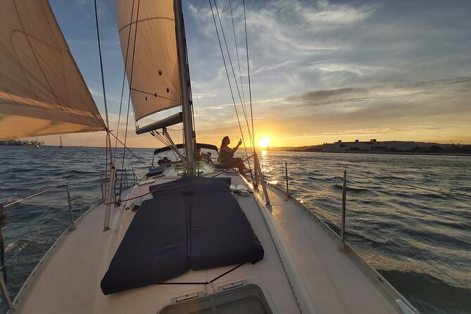 Lisbon Sunset Sailing with Portuguese Wine and History - Alfama’s Hill Energy: St. George’s Castle, Sé de Lisboa, and the Slopes Below