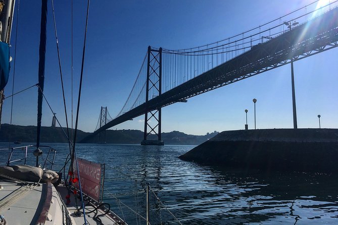 Lisbon Sunset Sensations on a Private Sailing Boat with wine&snacks - The royal palace on the hill: Lisbon’s power seen from above the Tagus