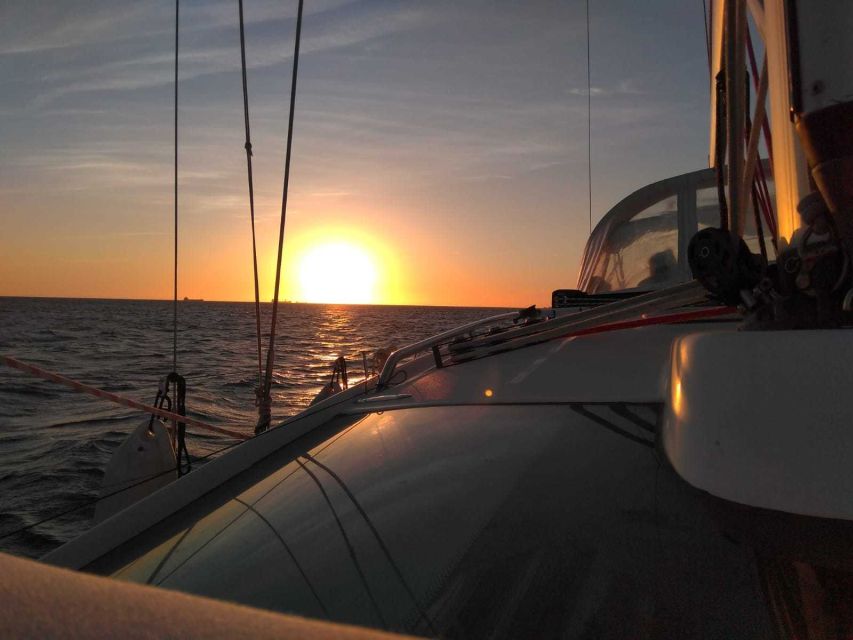 Lisbon: Tagus River Sailboat Tour - Sunset Mode: Drinks, Snacks, Blankets, and Photo Timing