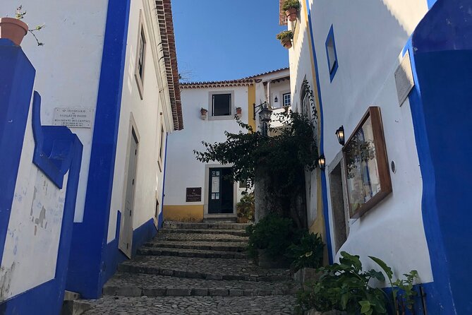 Lisbon to Fatima/Batalha/Nazare & Obidos guided tour 8pax group - Stop 5: Óbidos Village, Medieval Streets, and Ginga in Chocolate