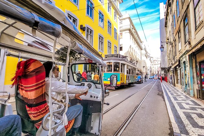 Lisbon tour Oldtown & Viewpoints on a tuktuk - Alfama walk: narrow streets, laundry balconies, and fado in the air