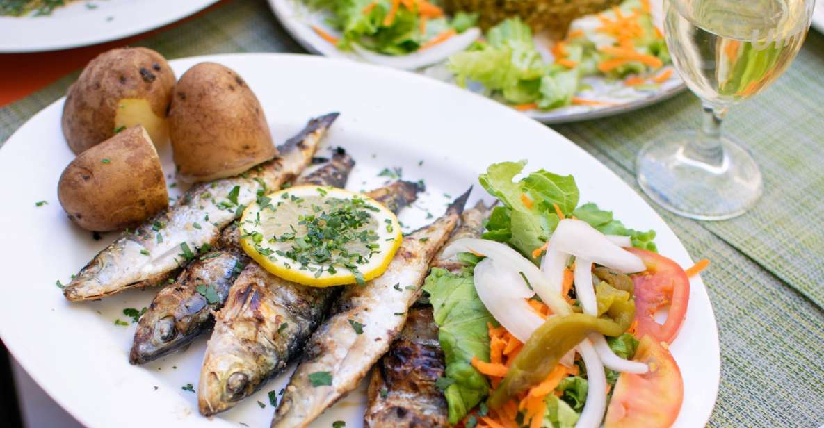 Lisbon Traditional Portuguese Food and Sightseeing Tour - Restaurant stop 1: traditional Portuguese food, explained as you eat