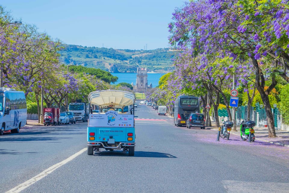 Lisbon: Tuk-Tuk Tour in French or German w/True Local Guide - Santa Justa Lift and the center sights: saving time where lines hurt