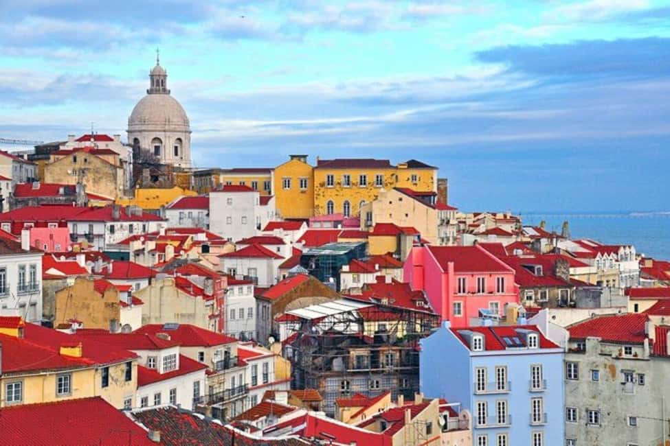 Lisbon: tuk-tuk tour with free hotel pickup - Rossio Square and Santa Justa Lift: Getting Oriented Fast
