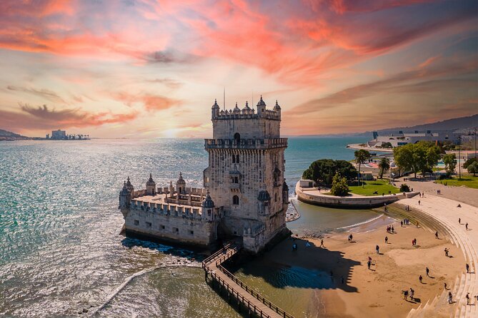 Lisbon Walking Tour: Belém Neighborhood, Tram & Boat Ride - Walking Lisbon’s key landmarks: Sé, Alfama, and Praça do Comércio