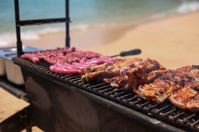 Ophelia Catamaran Cruises + Beach BBQ - Benagil beach BBQ: the part you’ll remember (about 3 hours on the sand)