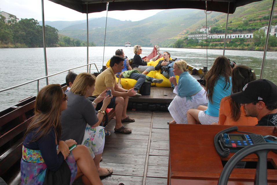 Pinhão: Private Rabelo Boat Tour along the River Douro - Rabelo boat comfort: open and closed areas for rain or shine