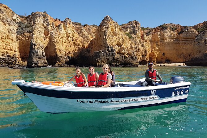 Ponta da Piedade Grotto Tour in Lagos, Algarve - Praia Dona Ana from the sea: golden rocks and a human story