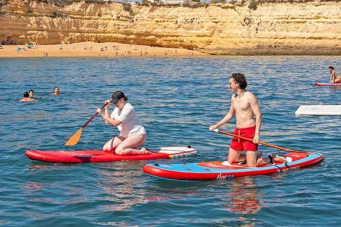 Portimao: Brunch and Benagil Caves - Sunbathing nets, paddle boards, and the inflatable waterpark reality check
