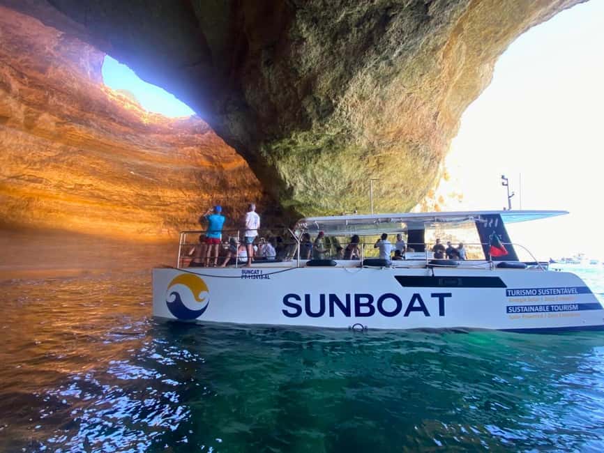 Portimao: SUNSET Benagil Caves Tour | Eco Catamaran - Where to meet: Pier M at Portimão Marina North Side